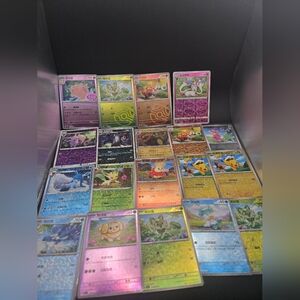 Pokemon Trading Cards with Blue, Green, and Purple Hues Masterball